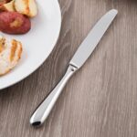 Libbey 213 2701 Baguette 9 3/4" Heavy Serrated Dinner Knife - 1