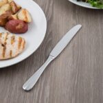 Libbey 213 5503 Baguette 9 3/4" Heavy Serrated Dinner Knife - 1